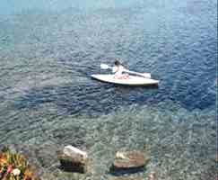 Ornos beach kayaker