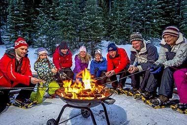 Sun Peaks hot dog cookout while snowshoe trekking