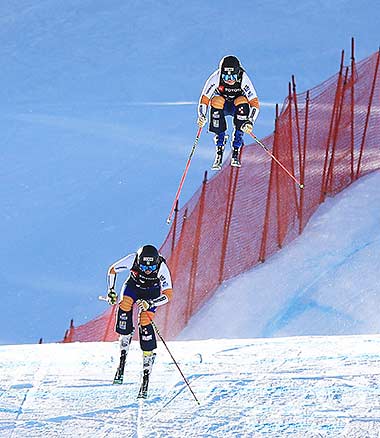 Brighton ski cross racers airborne