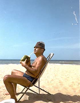 Guacharo, Venezuela, relaxing on beach