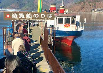 Boarding the excursion ship on Lake Kawaguchi to take photos of Mount Fuji from the water.