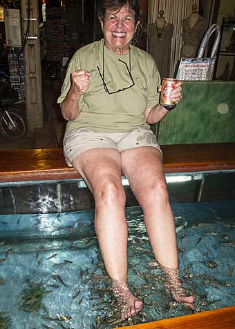 Feet in fish tank, Cambodia night market