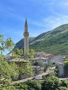 Minaret in Turkish-style village on the Neretva