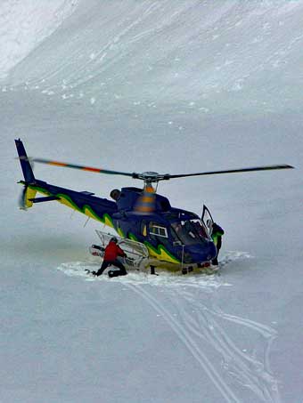 Unloading skis from heli